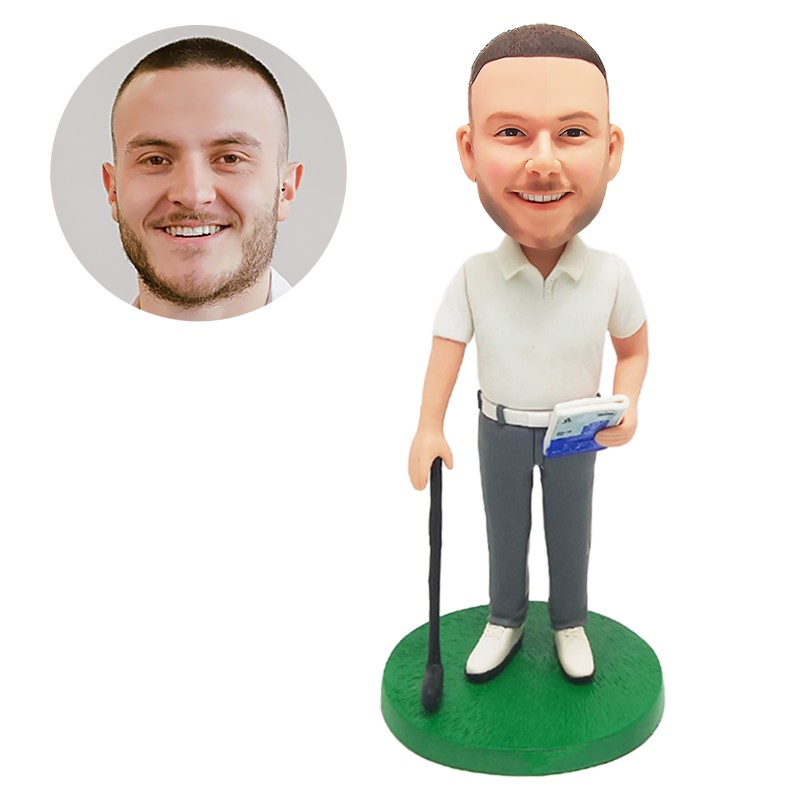 bobble head figurine hiking man holding a book