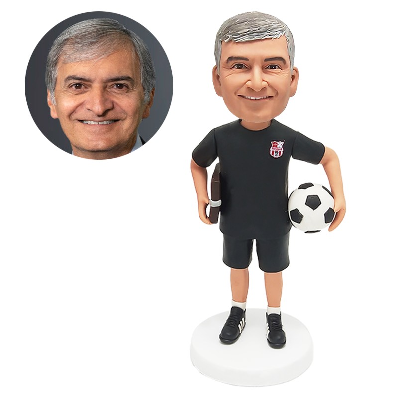 custom made bobblehead coach holding a book and soccer