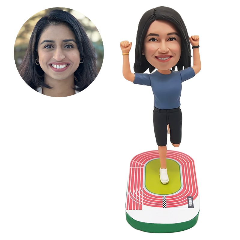 custom bobblehead female runner with hands up on the playground
