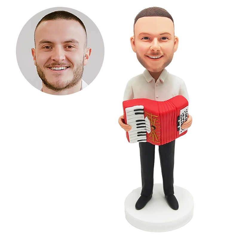 custom bobblehead man holding the accordion