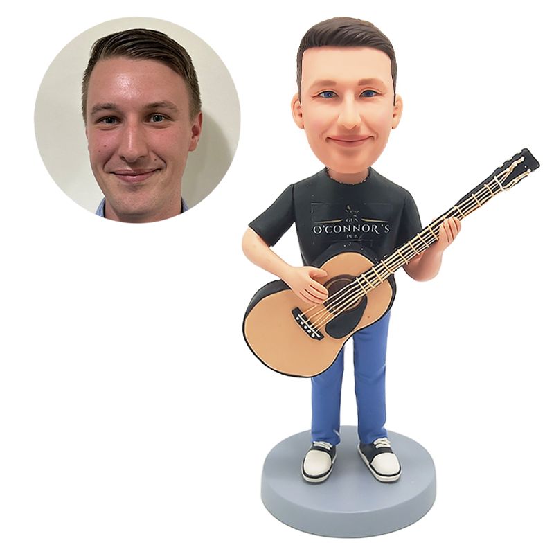 bobblehead custom musician holding a guitar