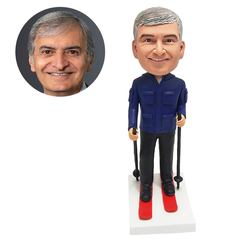 custom bobblehead figurine skiing man holding a ski pole