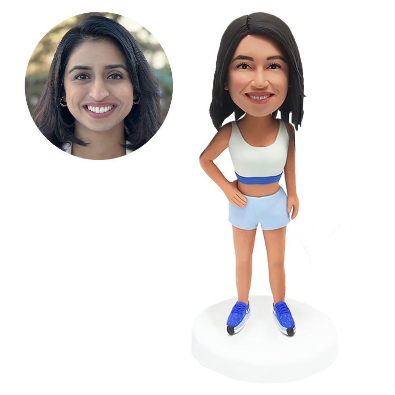 bobble head figurine sportswoman with one hand on the hip