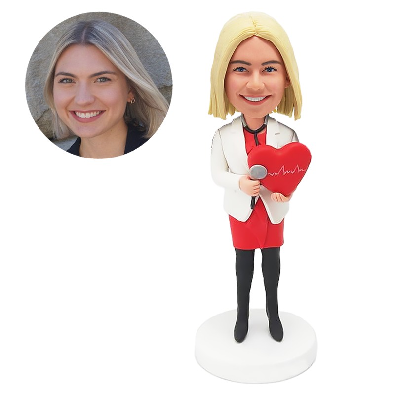 custom bobble head doctor holding a heart shaped pillow