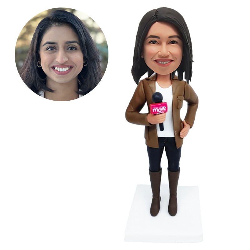 custom bobble head journalist holding a megaphone