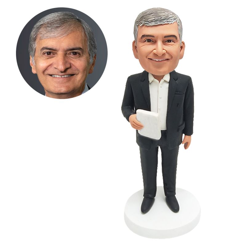 custom made bobblehead male boss holding a notebook
