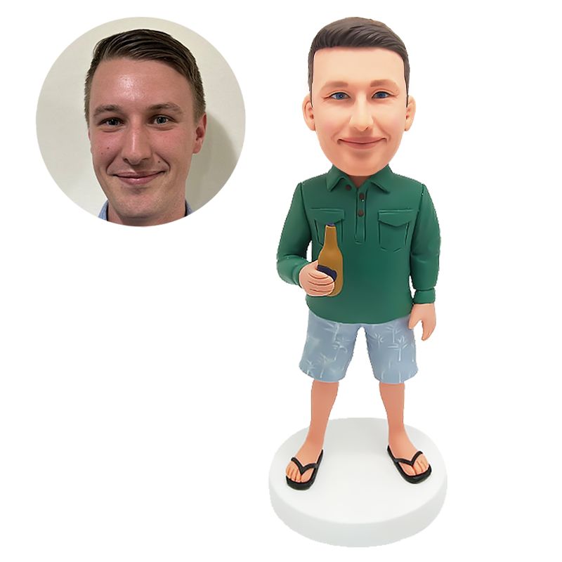 bobble head figurine man holding a beer