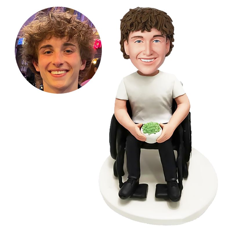 custom bobblehead casual man sitting on the wheel with a plant