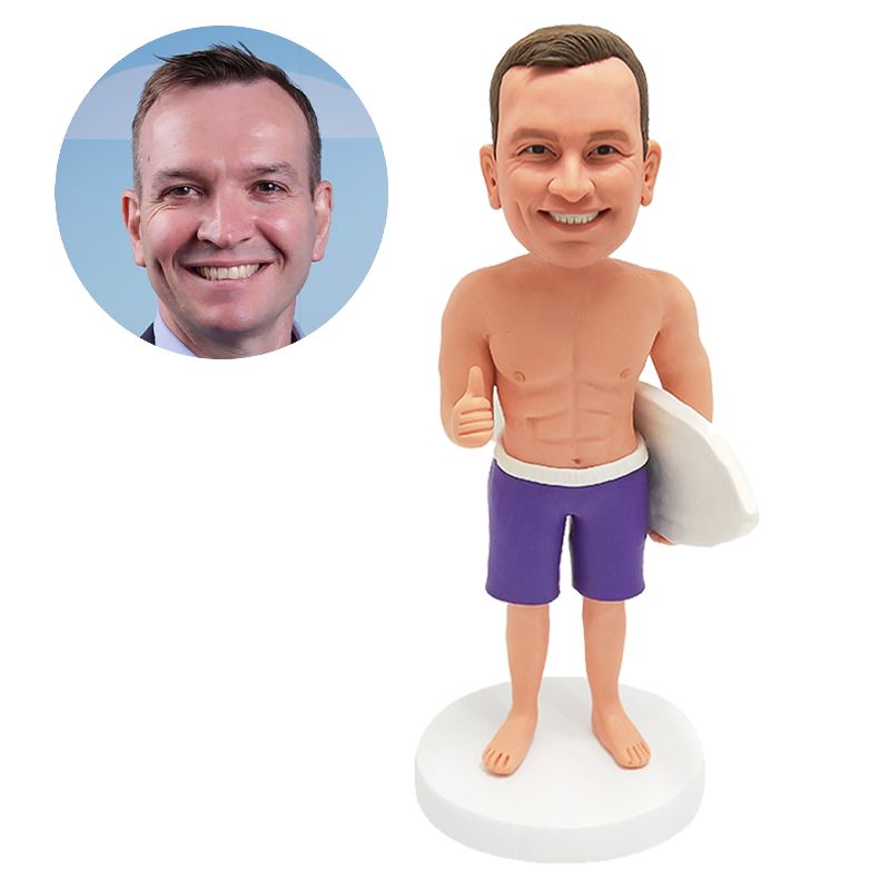 custom bobblehead man holding a skateboard