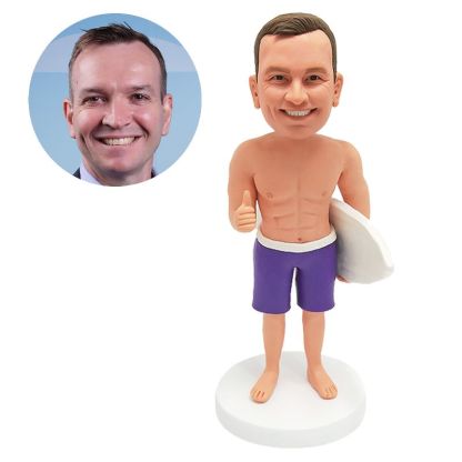 custom bobblehead man holding a skateboard