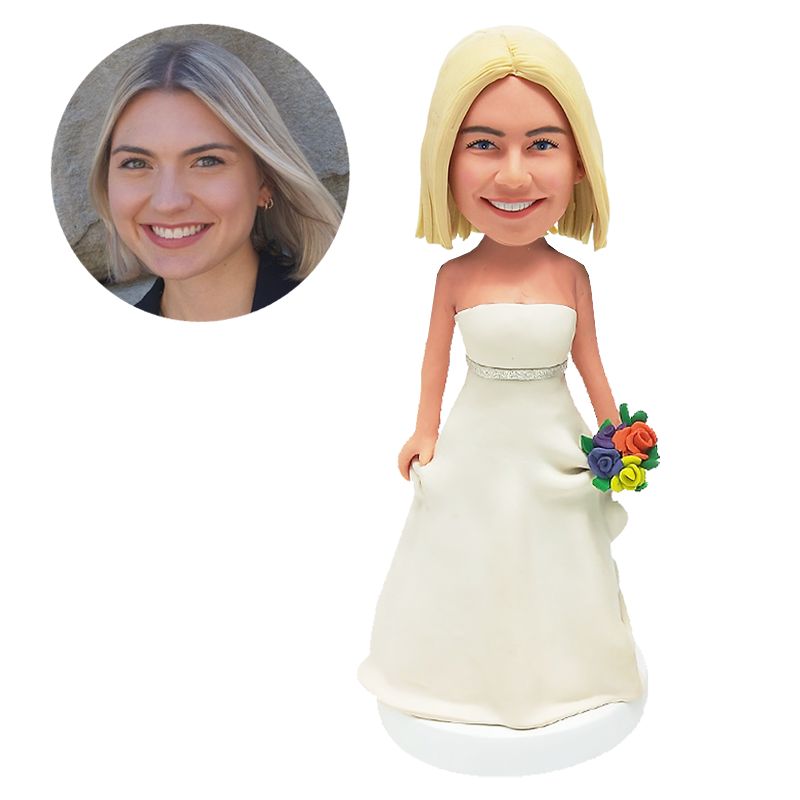 bobble head figurine pretty bride holding a flower bouquet