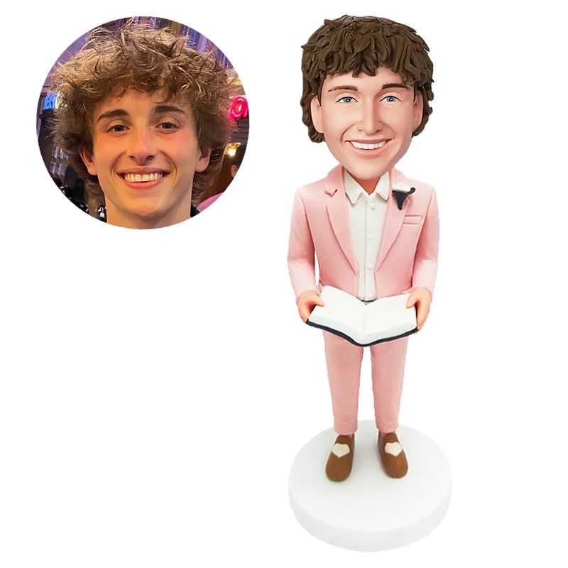 custom made bobblehead business man holding a book