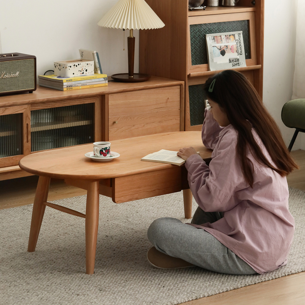 引き出し付き楕円形ウッドセンターテーブル | 収納力と美しさを両立