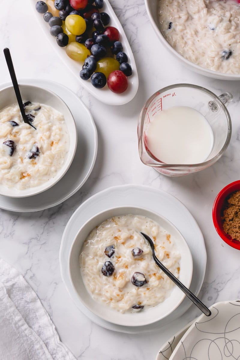 A picture of the finished rice pudding made from a ceramic cooker and recipe book.