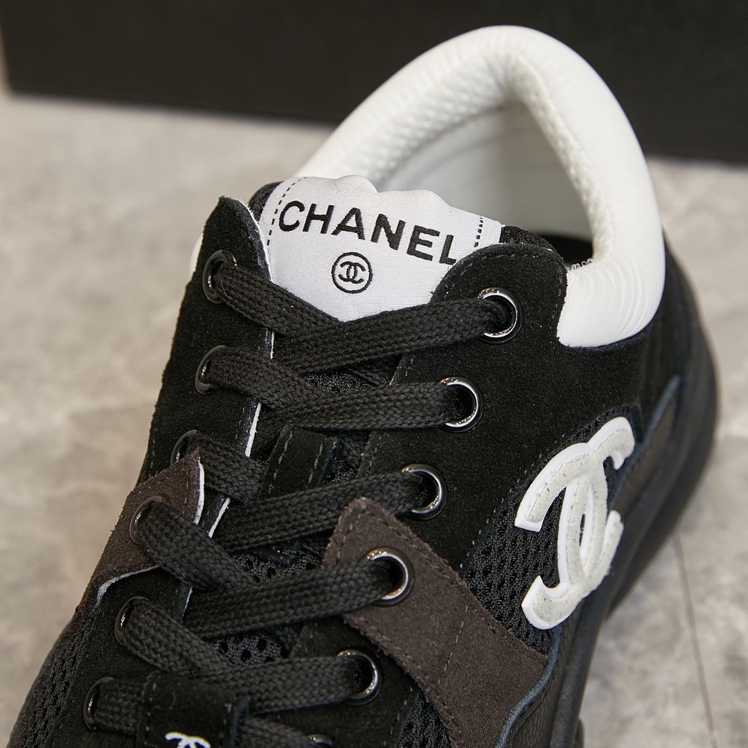 Chanel sneakers and Gucci slippers