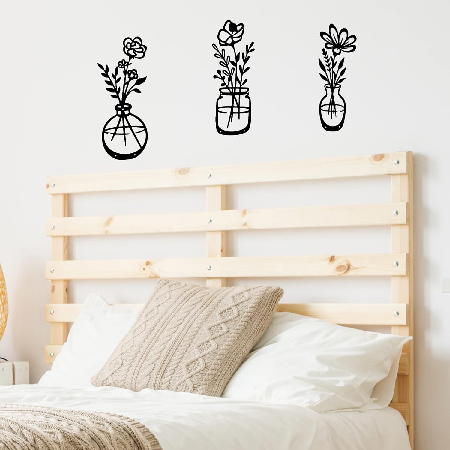 Set de 3 flores de metal negro para decoración de pared, ideal para interiores.