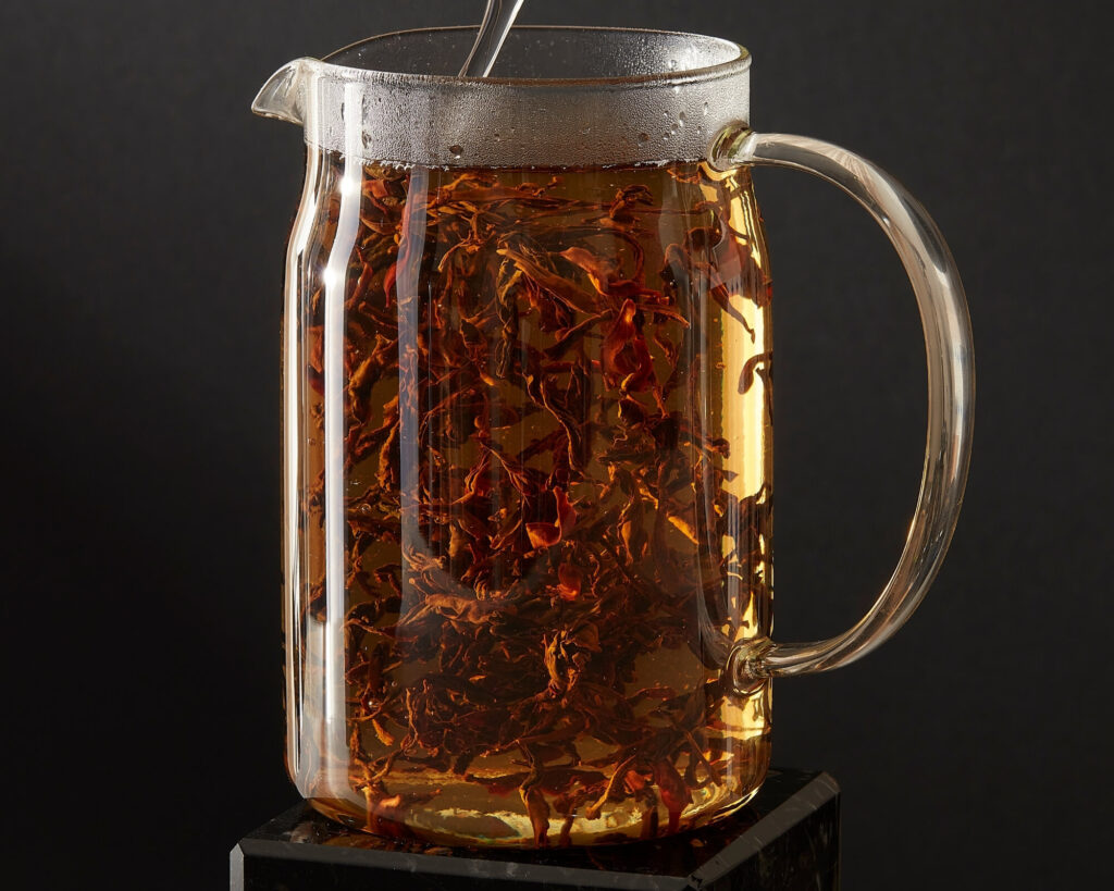 A beautiful wild tea from Chinese Yunnan - camellia taliensis - mountain grown rare black tea. Da Xue Shan Wild Tree Black Tea.