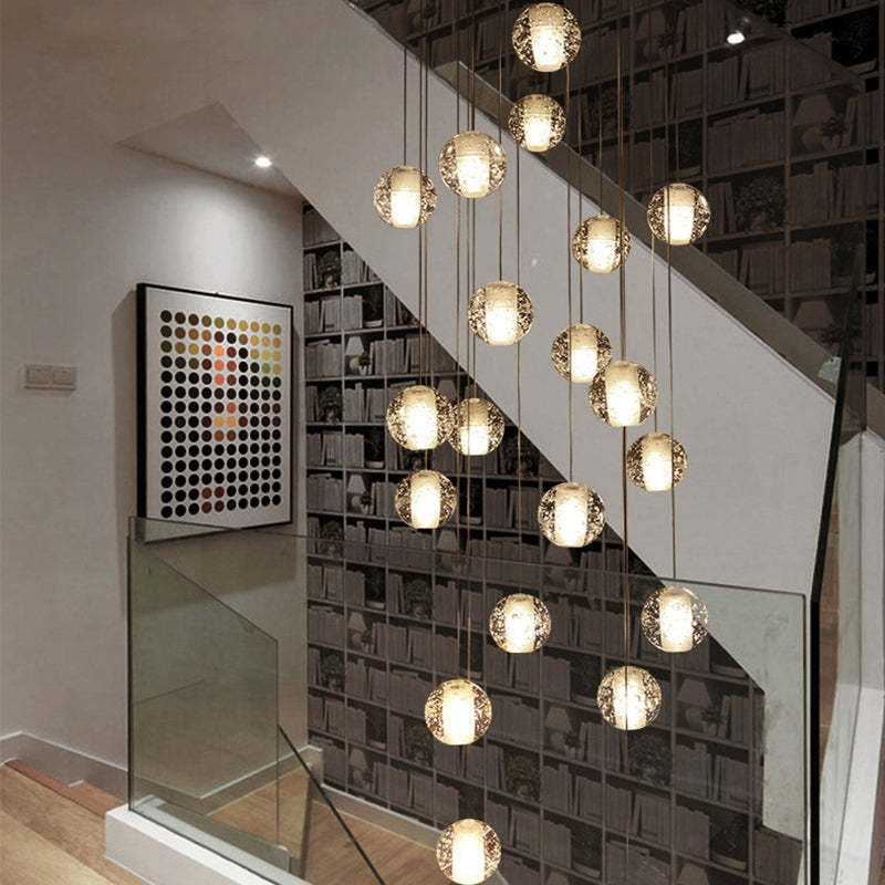 chandelier,chandeliers,long stairs,round,ball,clear glass,large,extra large,huge,big,oversize,spiral stairs,gold