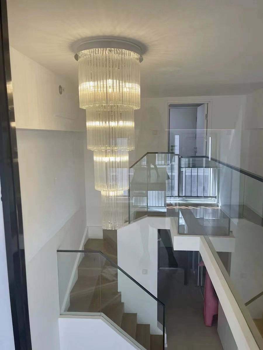 luxury, extra large, oversized,crystal, flush mount chandeliers, high-ceiling space,staircase, grand living room, duplex, luxurious 2-floor loft, entryway, deluxe, foyer and hotel lobby.