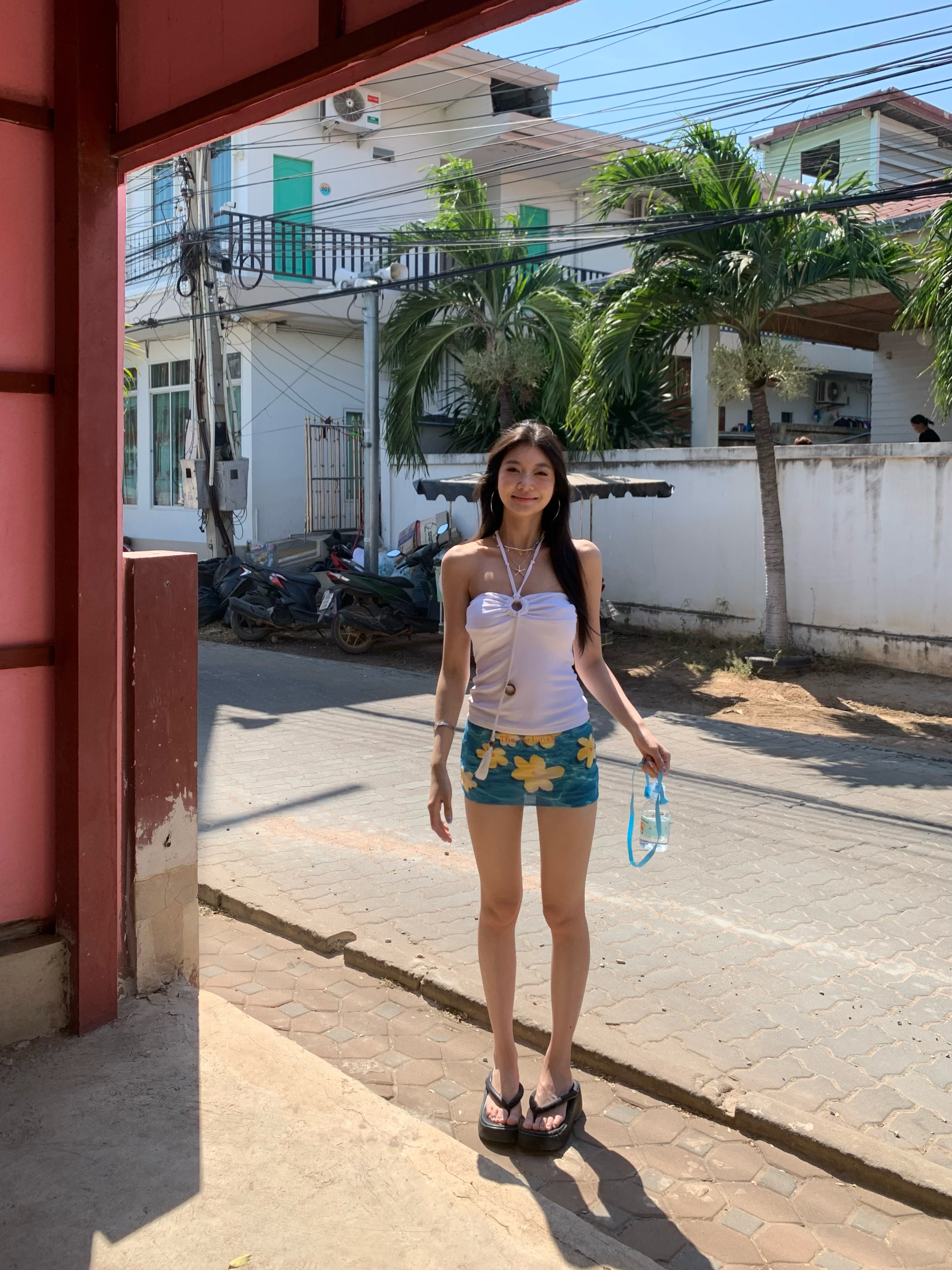 (Very short) low-waist pencil skirt, mesh fabric with frangipani pattern, with lining