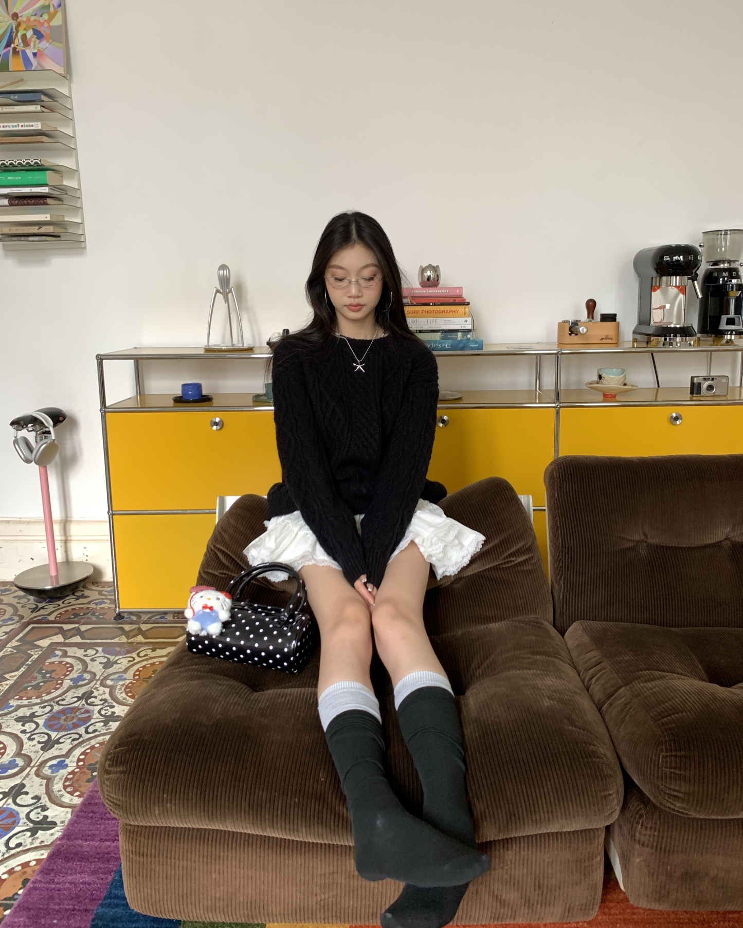 Women's knitted sweater with spiral pattern