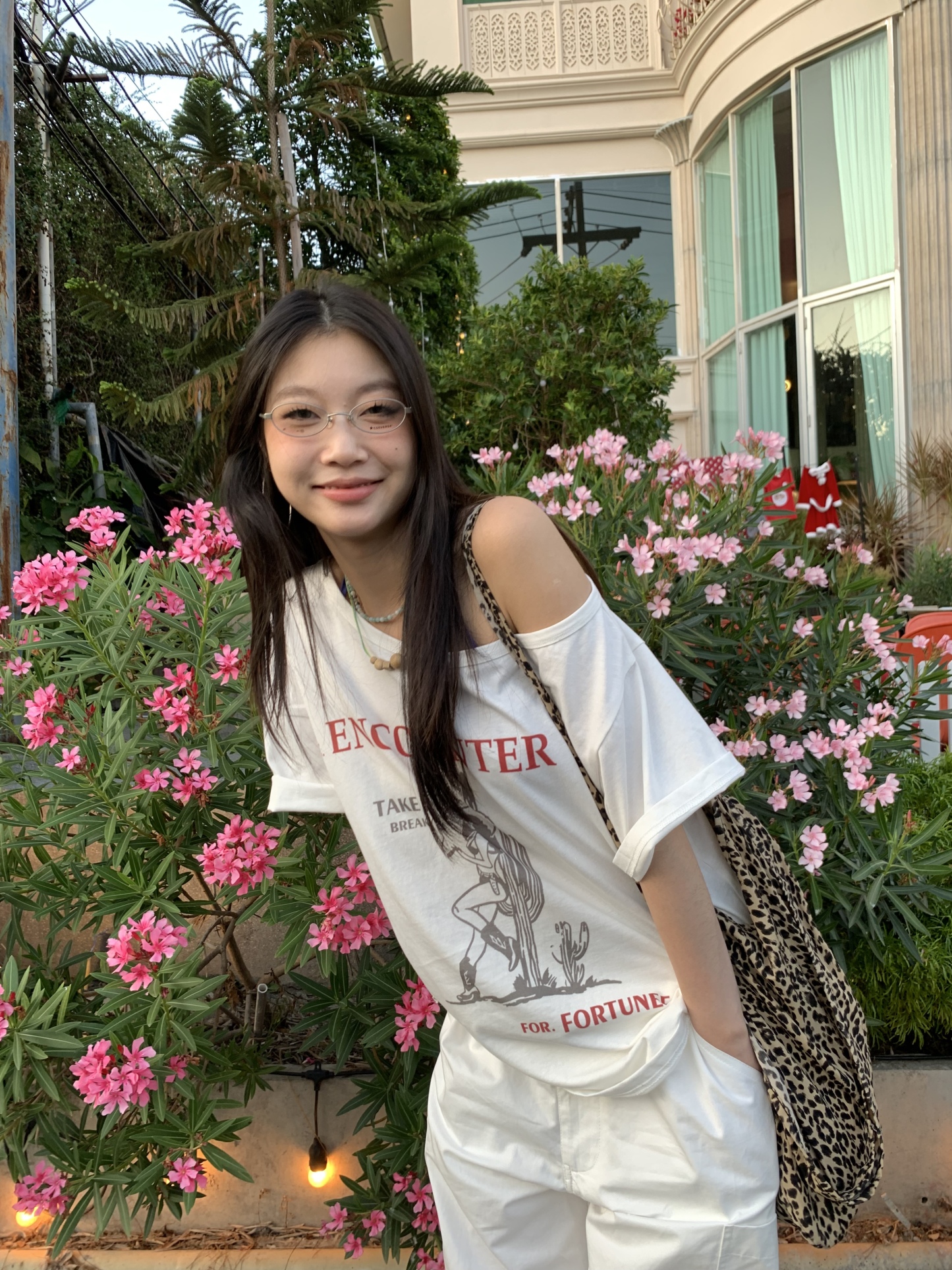 Off-shoulder design T-shirt with a denim cowboy print