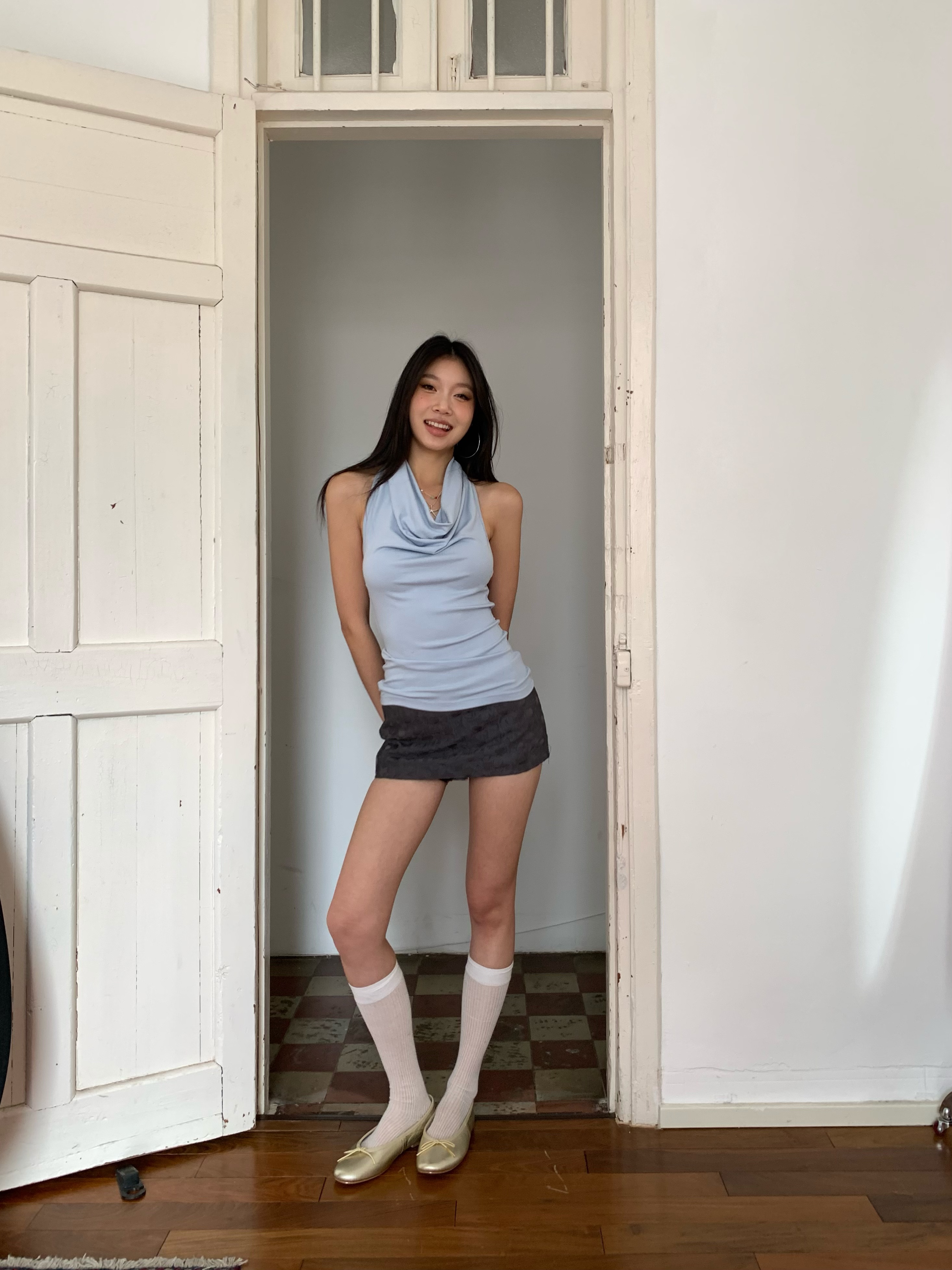 Dark grey low-waisted mini skirt with textured fabric
