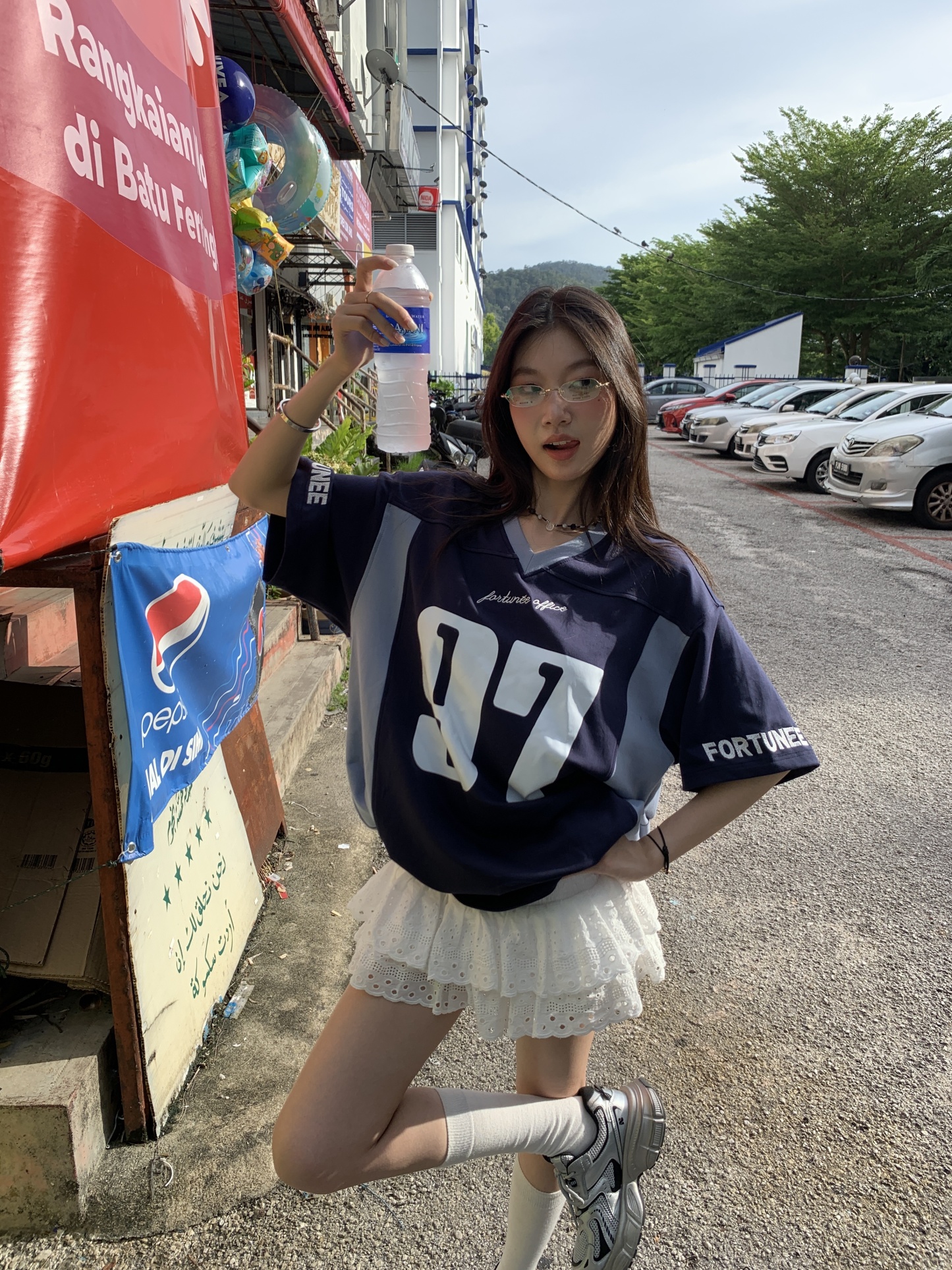 A low-waist short skirt with embroidered patterns, lace-trimmed edges, and a puffy cake-style design.