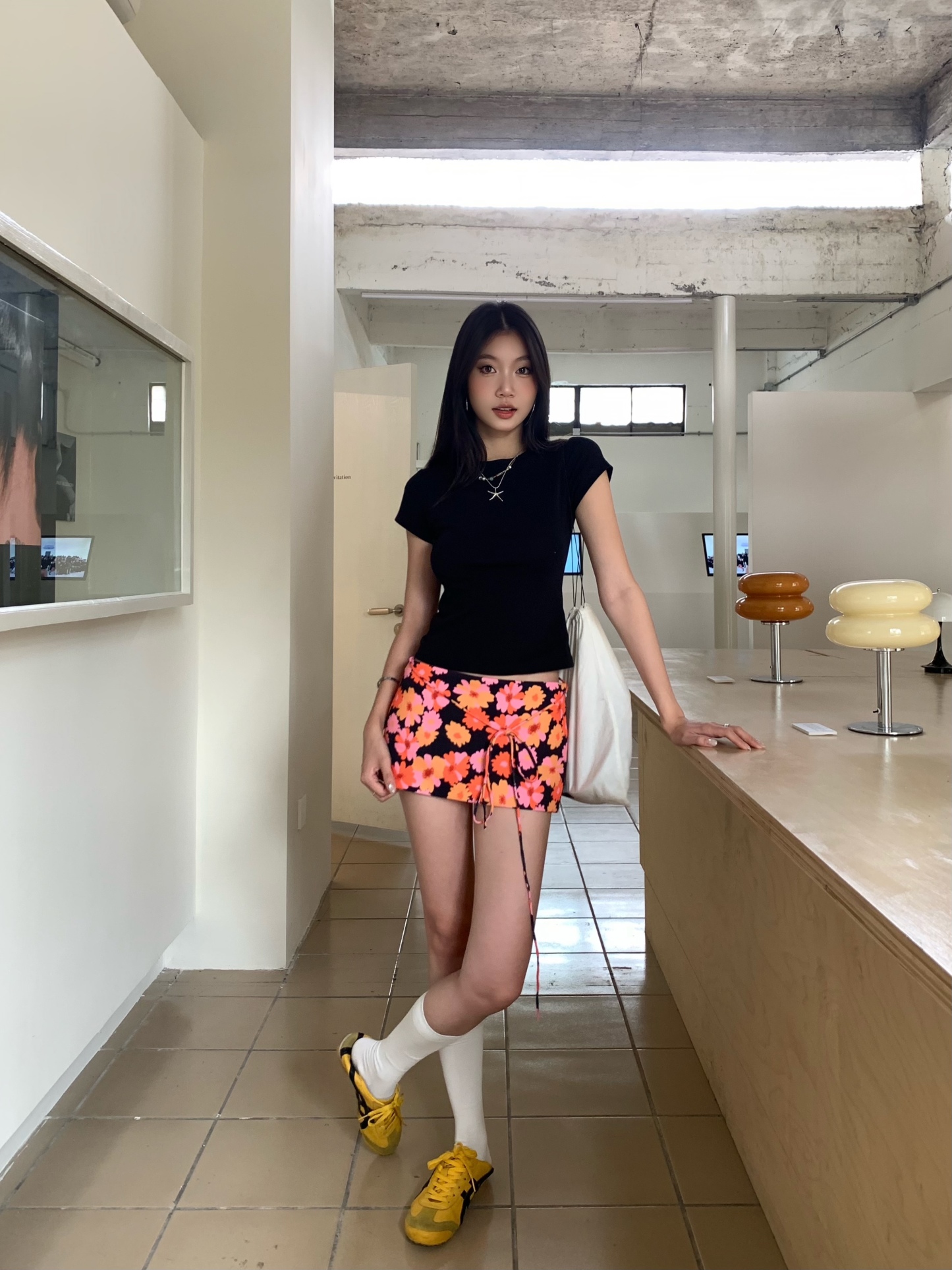 Low-waist tight mini skirt, lace-up design, orange daisy pattern