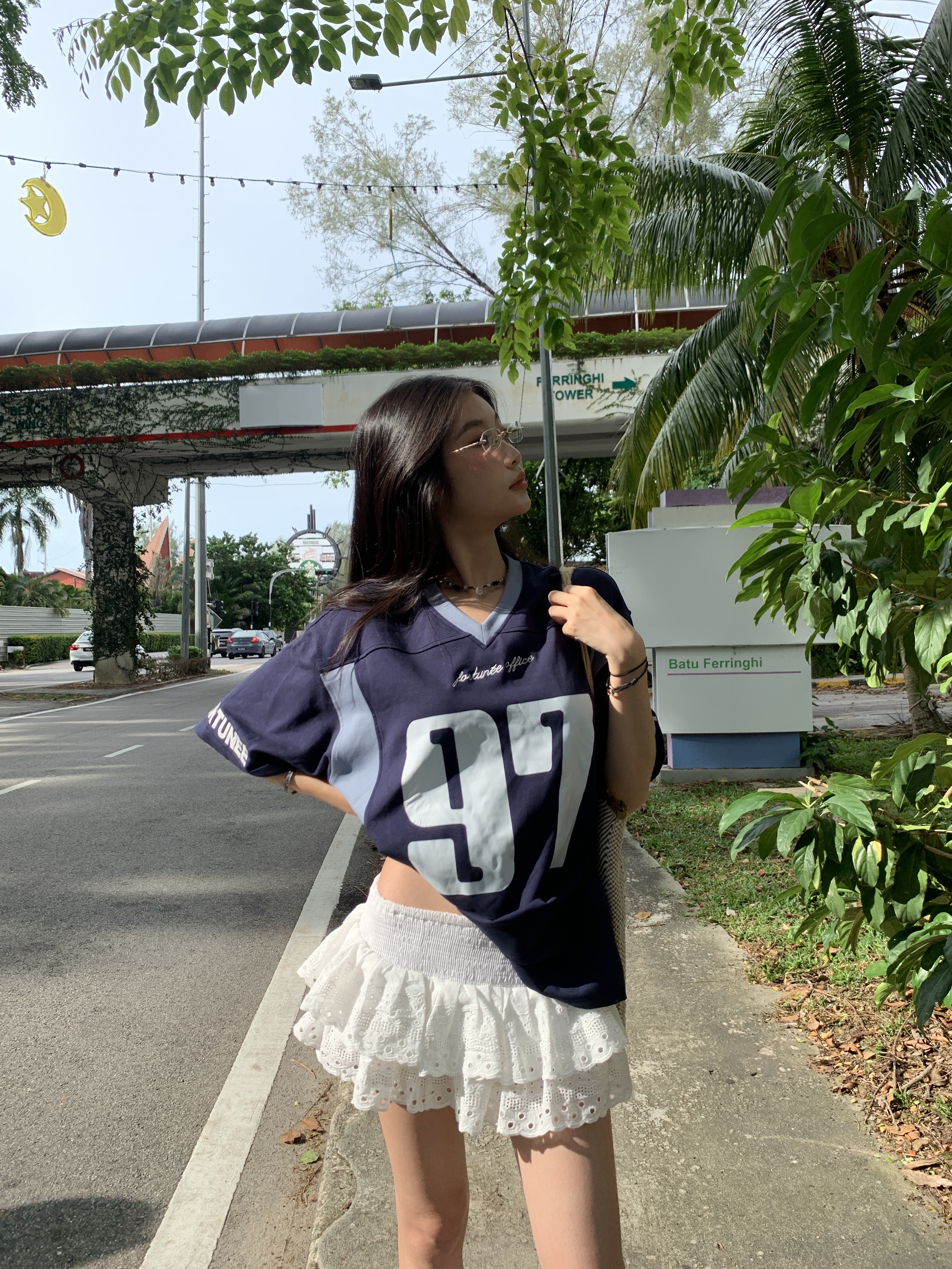 A low-waist short skirt with embroidered patterns, lace-trimmed edges, and a puffy cake-style design.