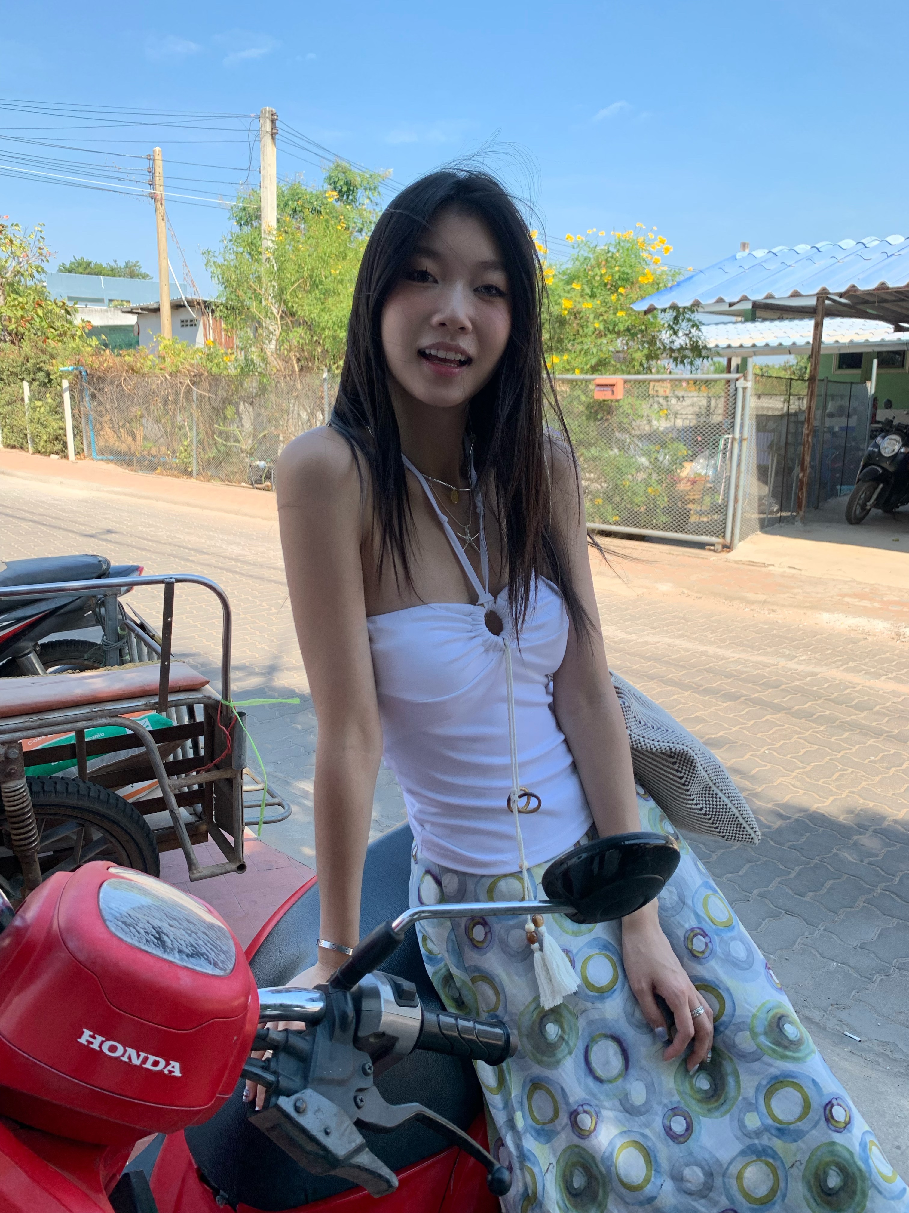 A fitted halter neck top that can be worn as a bra or on its own for a fresh summer look