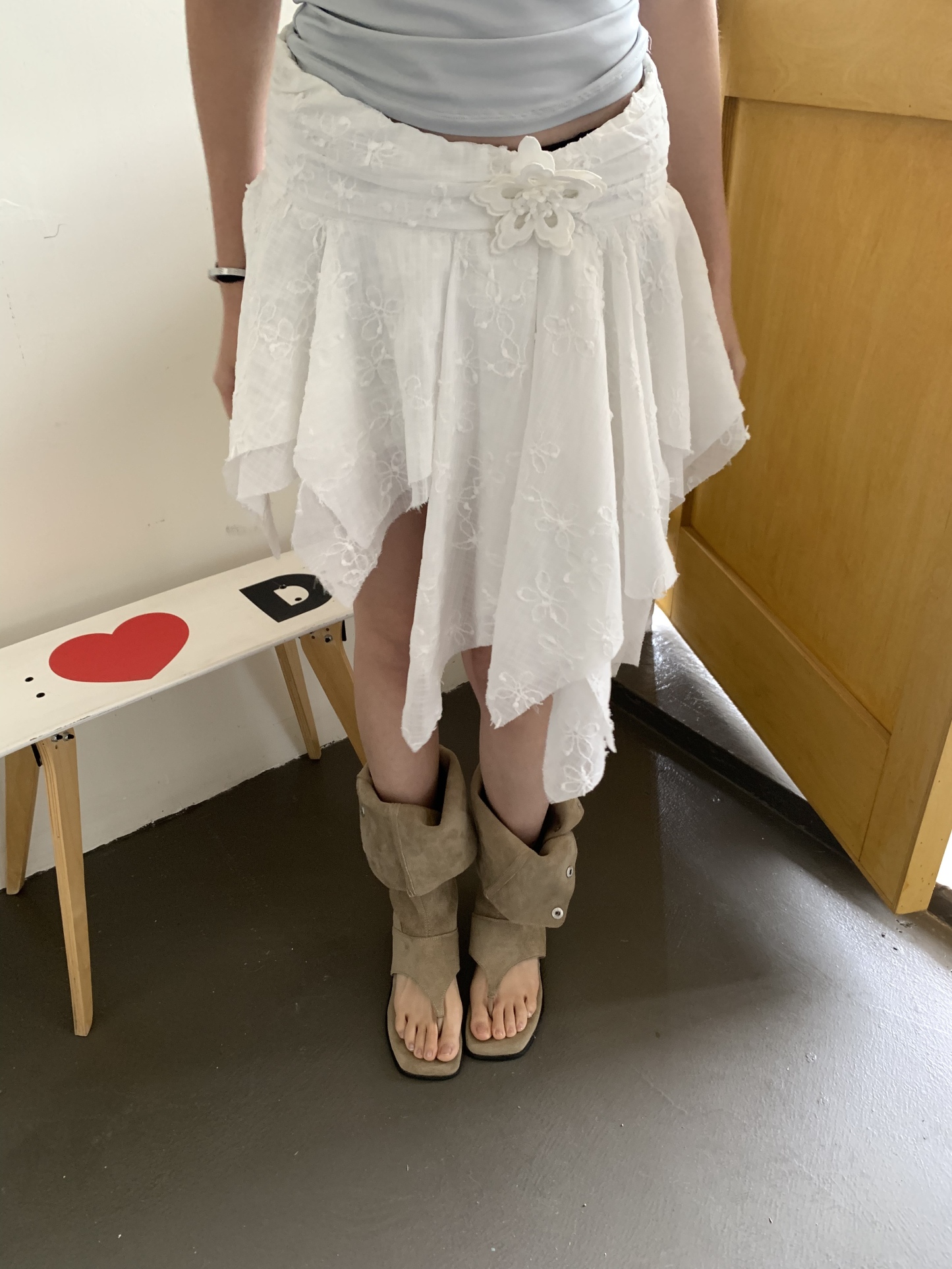 A-line mini skirt decorated with 3D flowers and ribbons