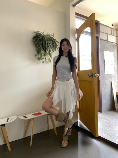 A-line mini skirt decorated with 3D flowers and ribbons