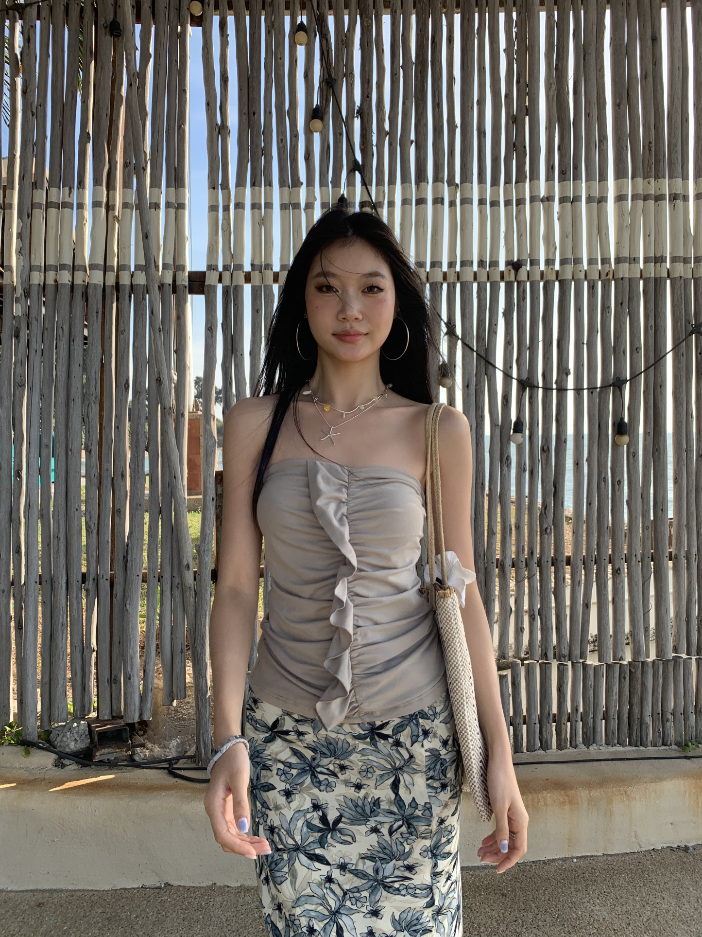 A tube top with a ruffled design, a tight waist, and a hot style.