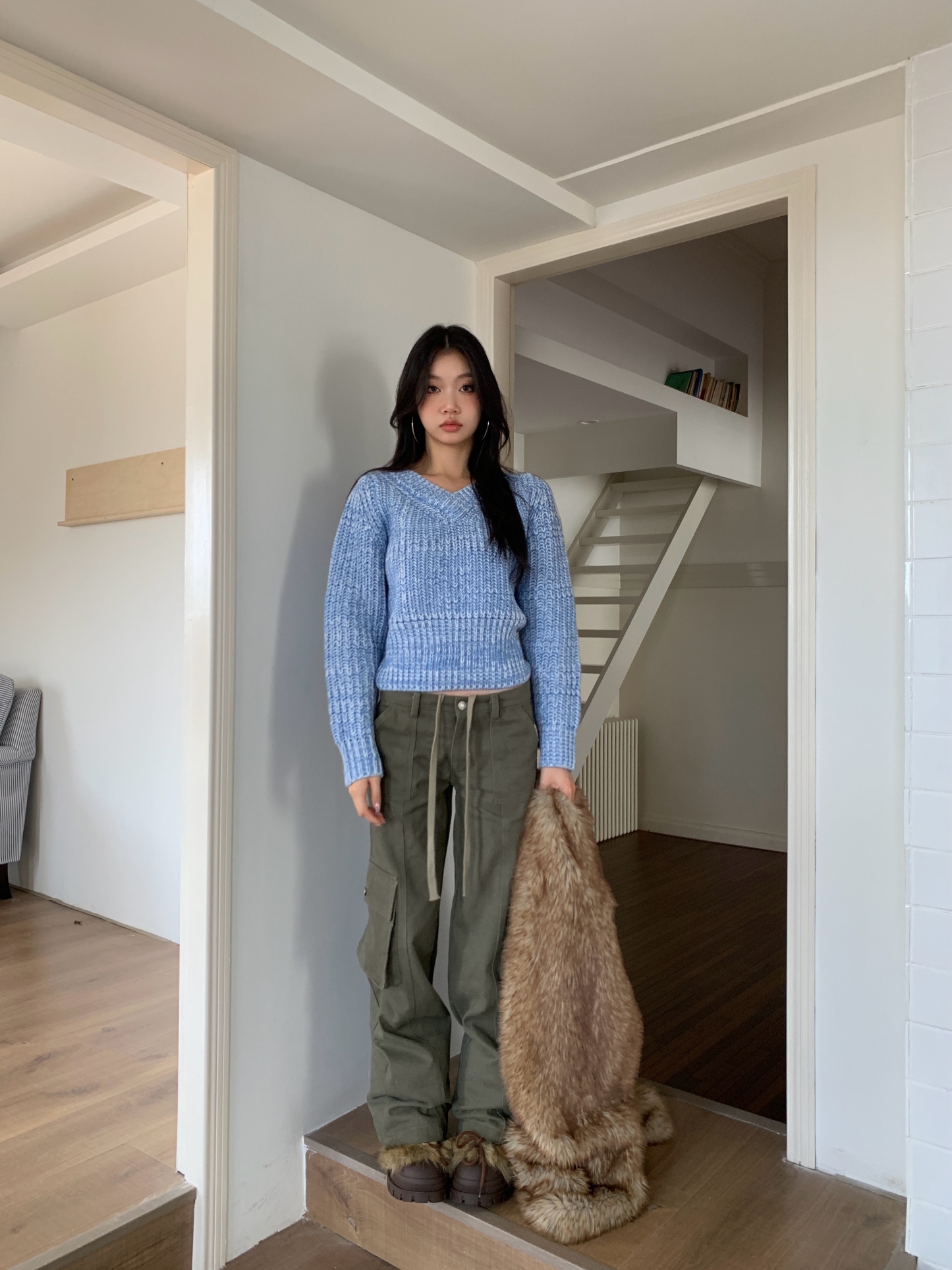 Vintage low-rise cargo pants with multiple pockets and a wide, straight leg.