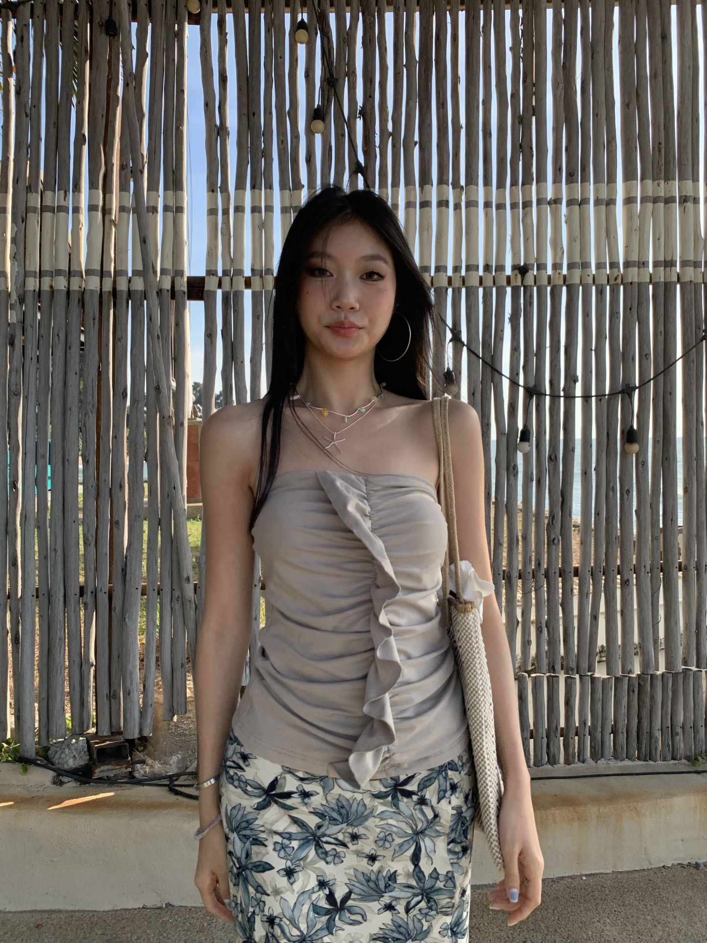 A tube top with a ruffled design, a tight waist, and a hot style.