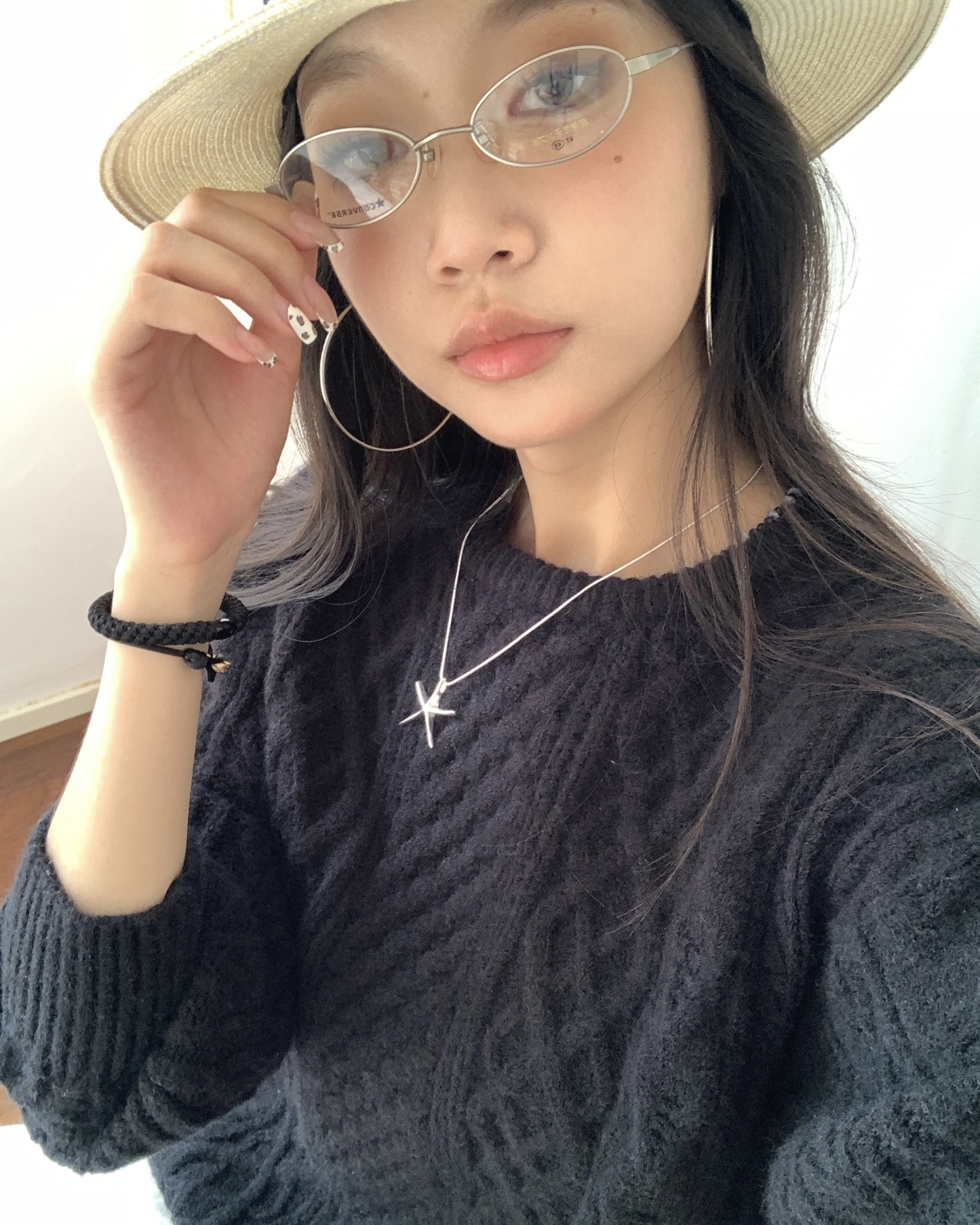 Women's knitted sweater with spiral pattern
