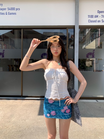 Low-waist mini skirt (short style) fitted vacation style, decorated with floral mesh fabric, new design in 2025