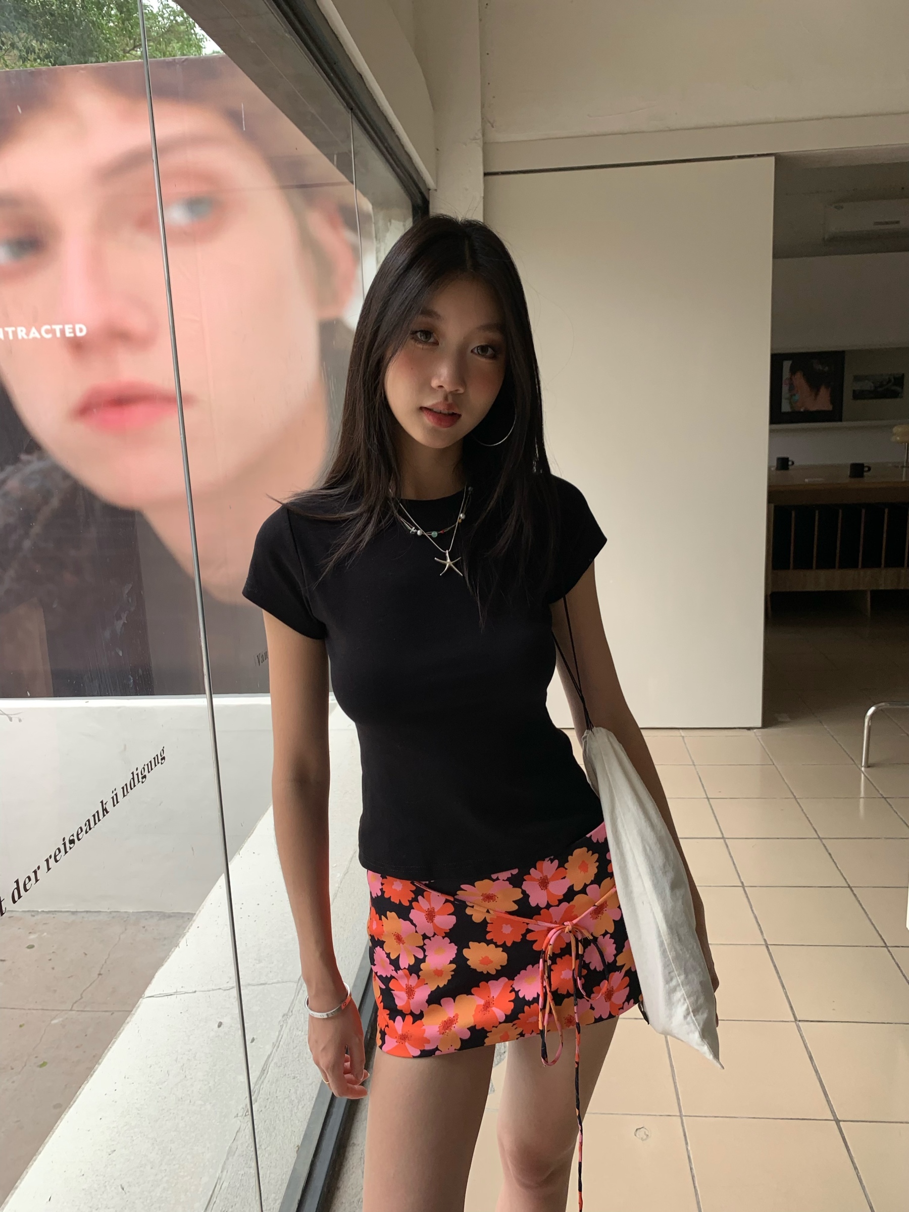 Low-waist tight mini skirt, lace-up design, orange daisy pattern