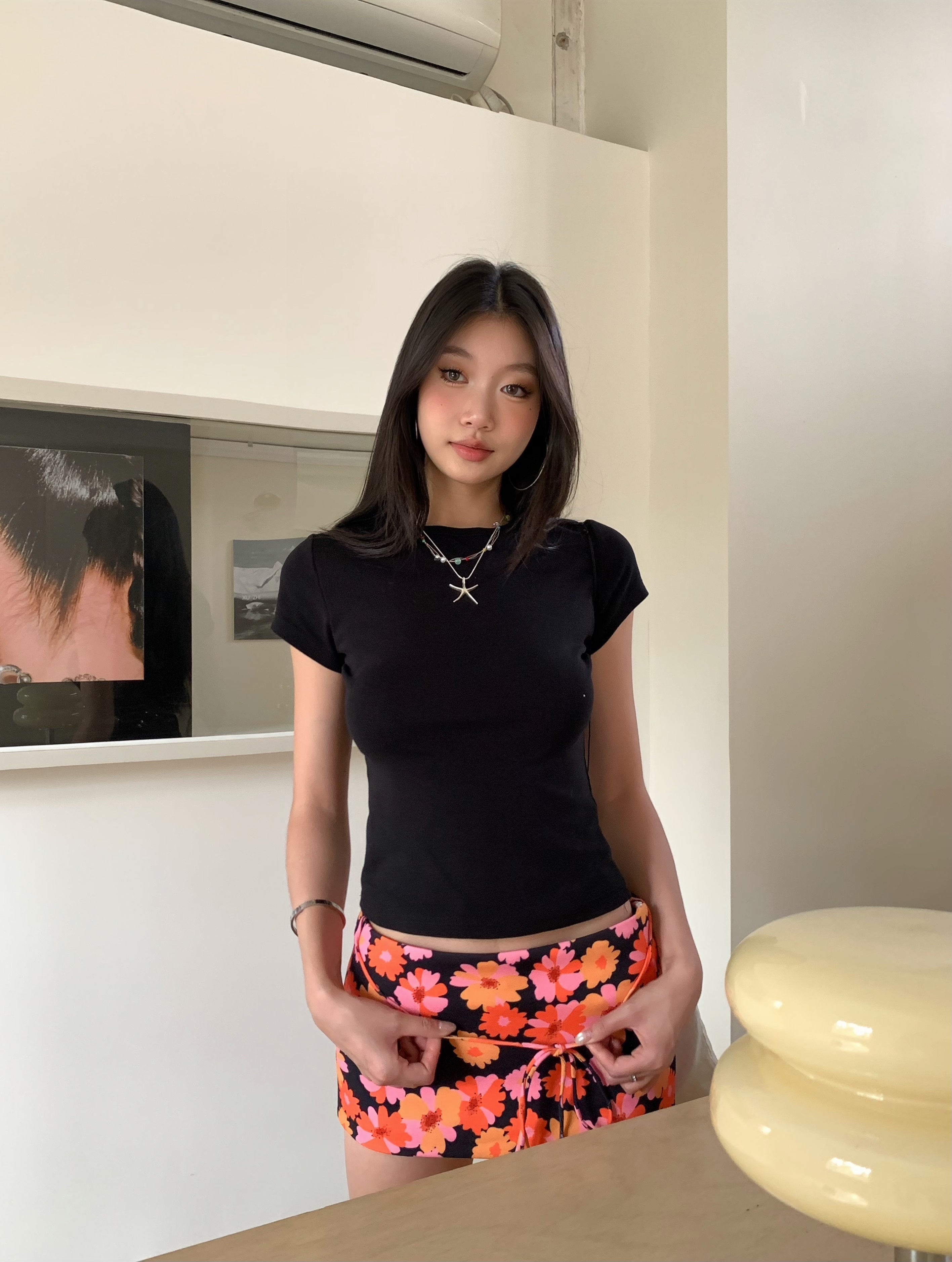 Low-waist tight mini skirt, lace-up design, orange daisy pattern