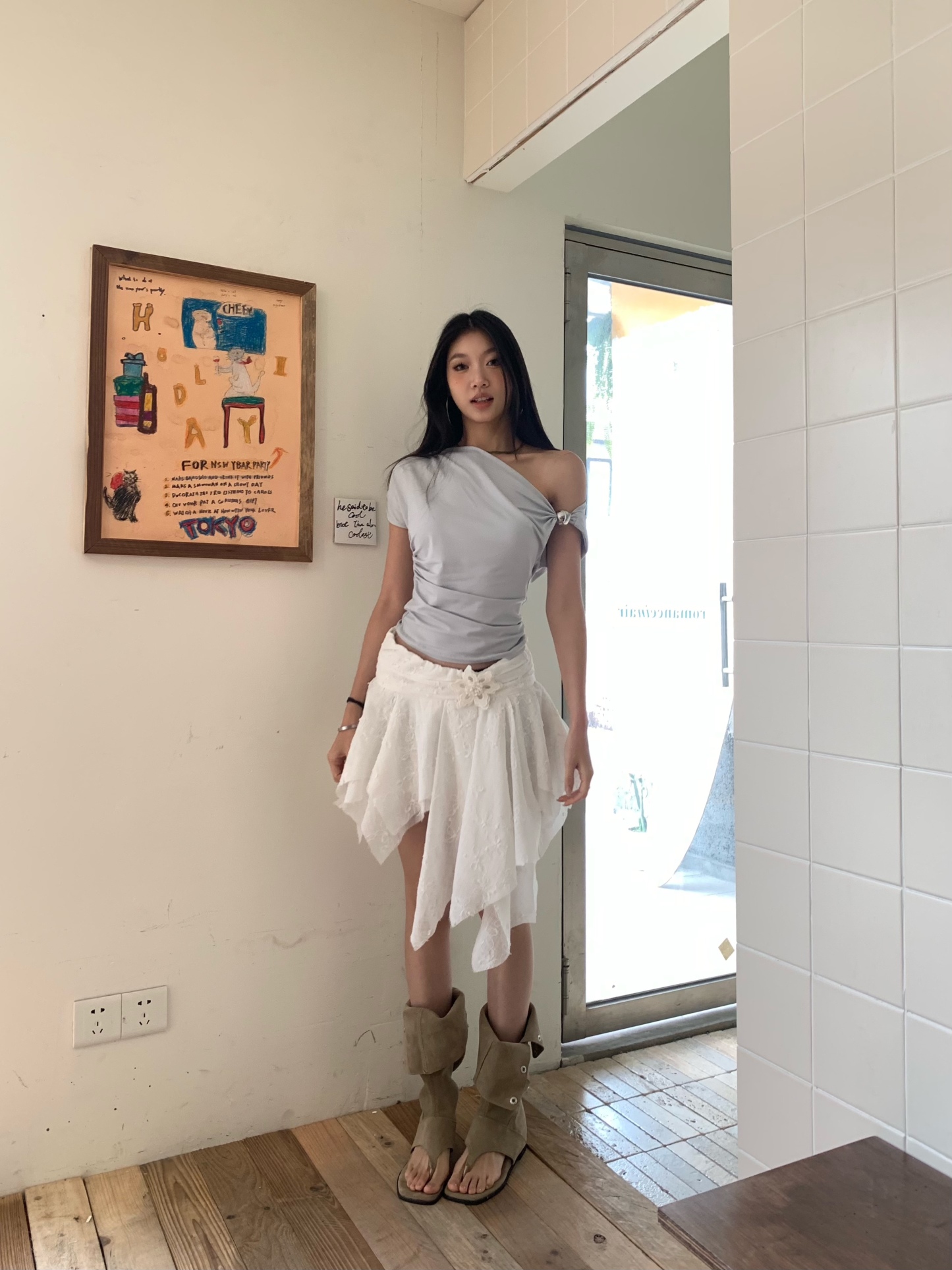 A-line mini skirt decorated with 3D flowers and ribbons