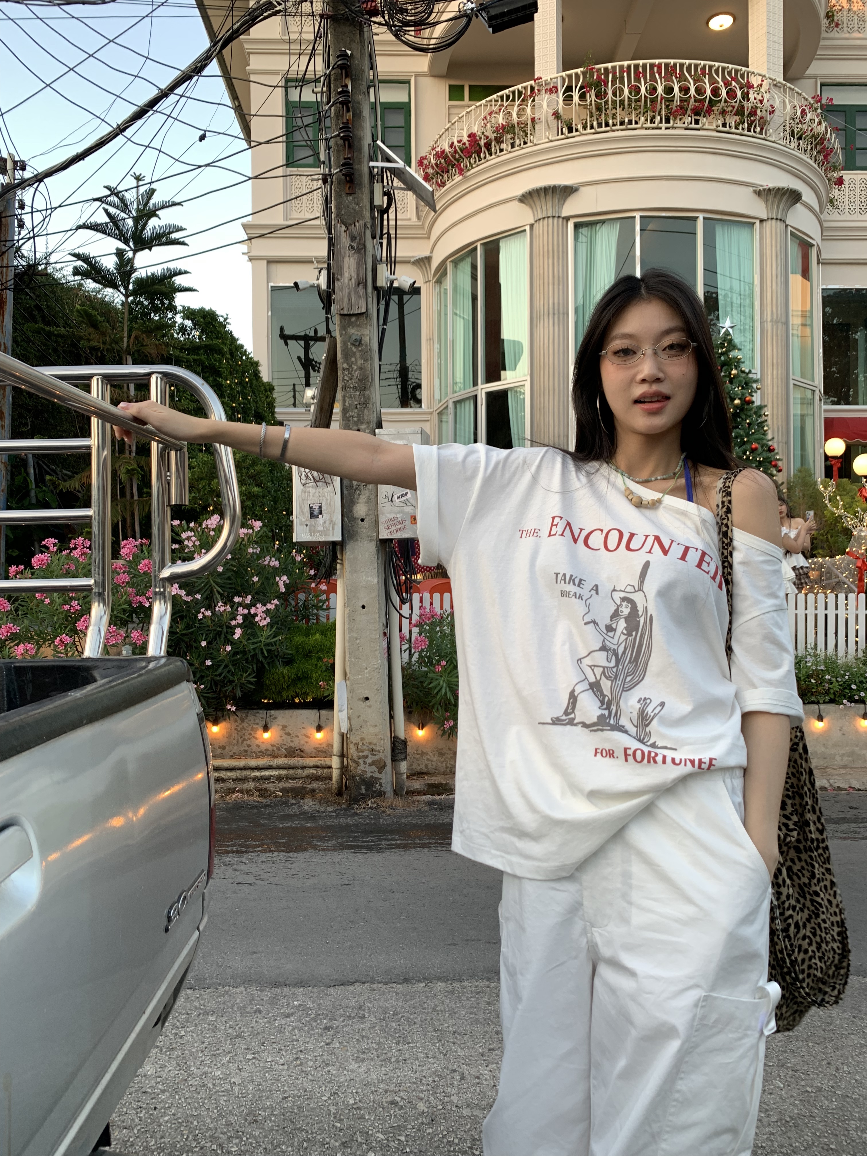 Off-shoulder design T-shirt with a denim cowboy print