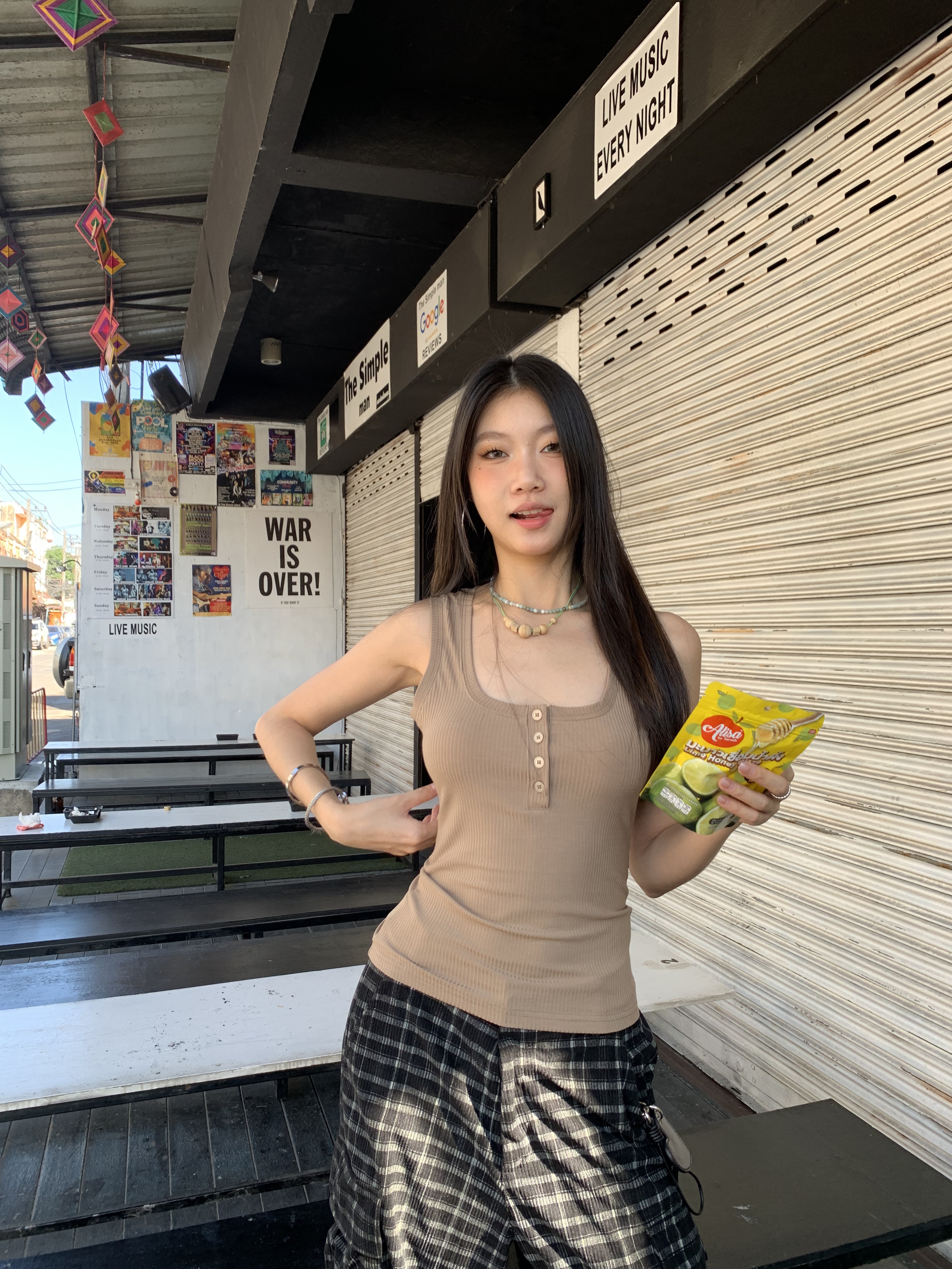 Two-tone button-up vest with a slim-fit design that helps tighten the waist