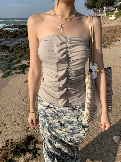 A tube top with a ruffled design, a tight waist, and a hot style.