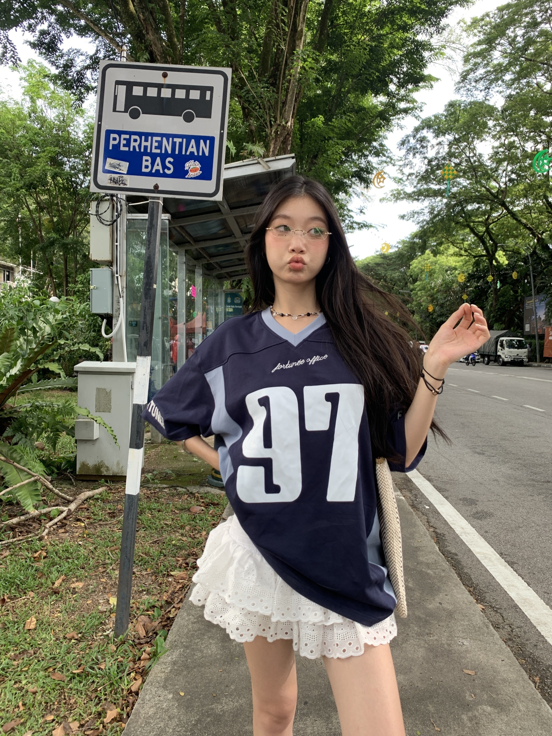 A low-waist short skirt with embroidered patterns, lace-trimmed edges, and a puffy cake-style design.