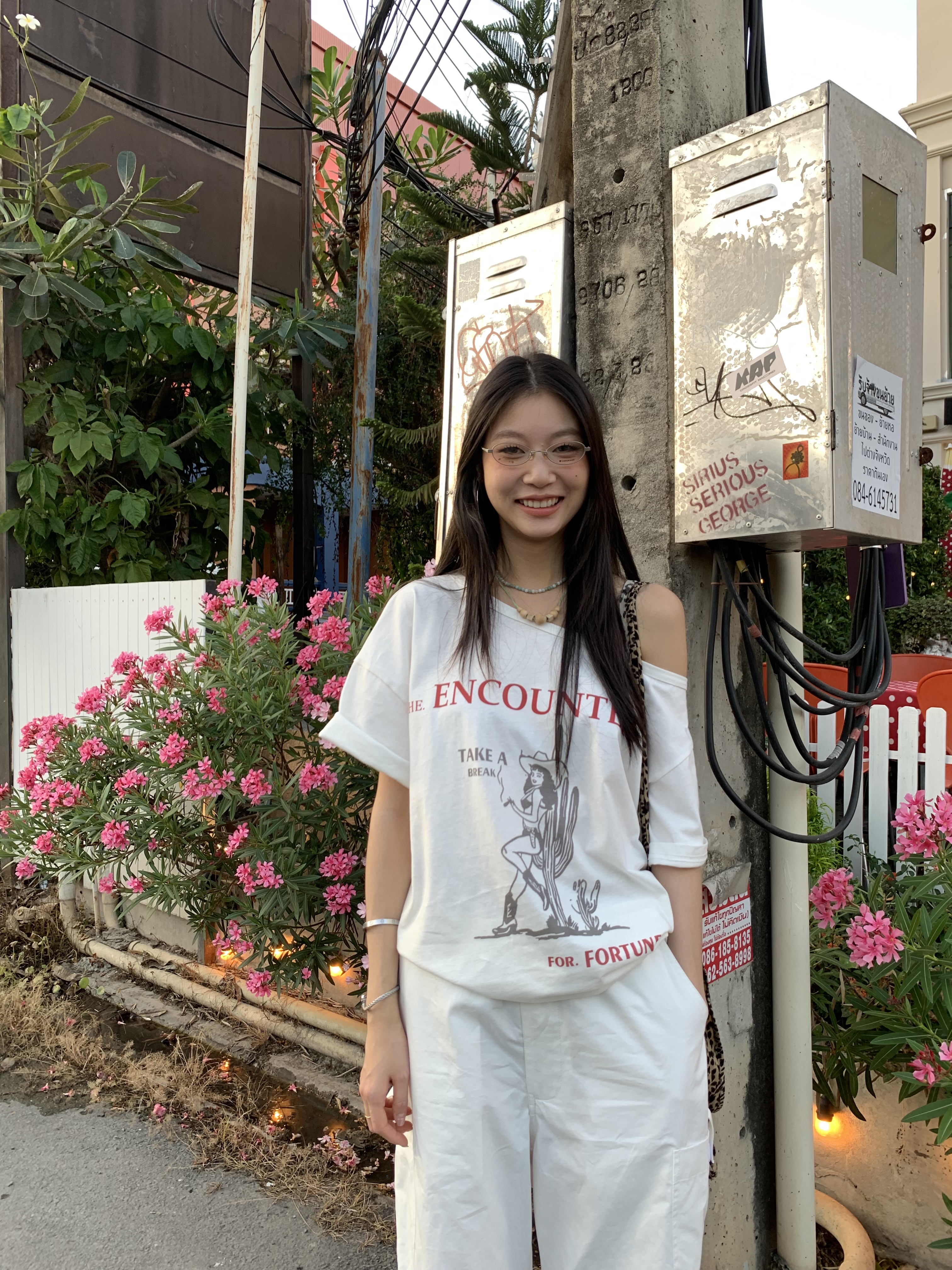 Off-shoulder design T-shirt with a denim cowboy print