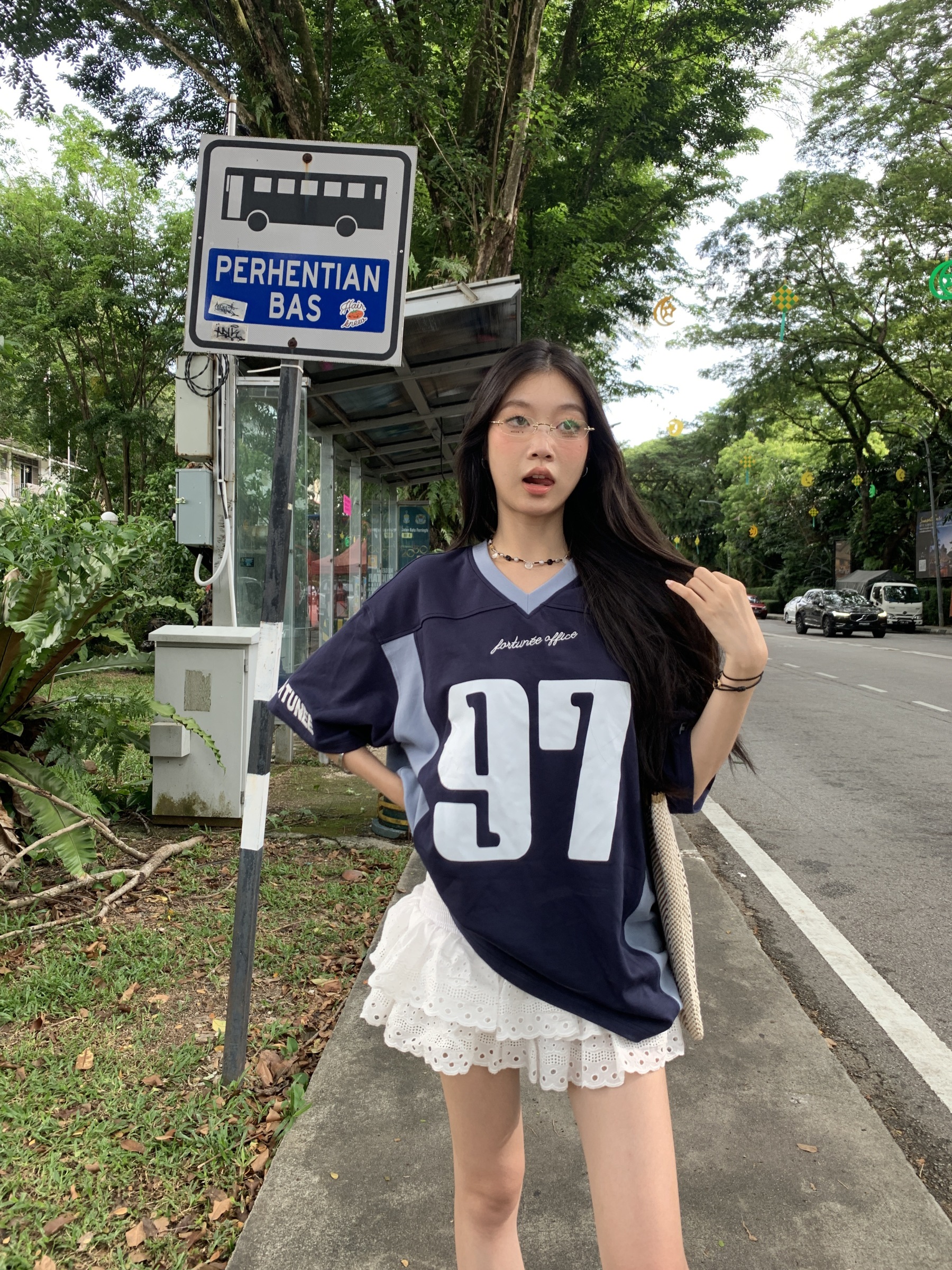 A low-waist short skirt with embroidered patterns, lace-trimmed edges, and a puffy cake-style design.