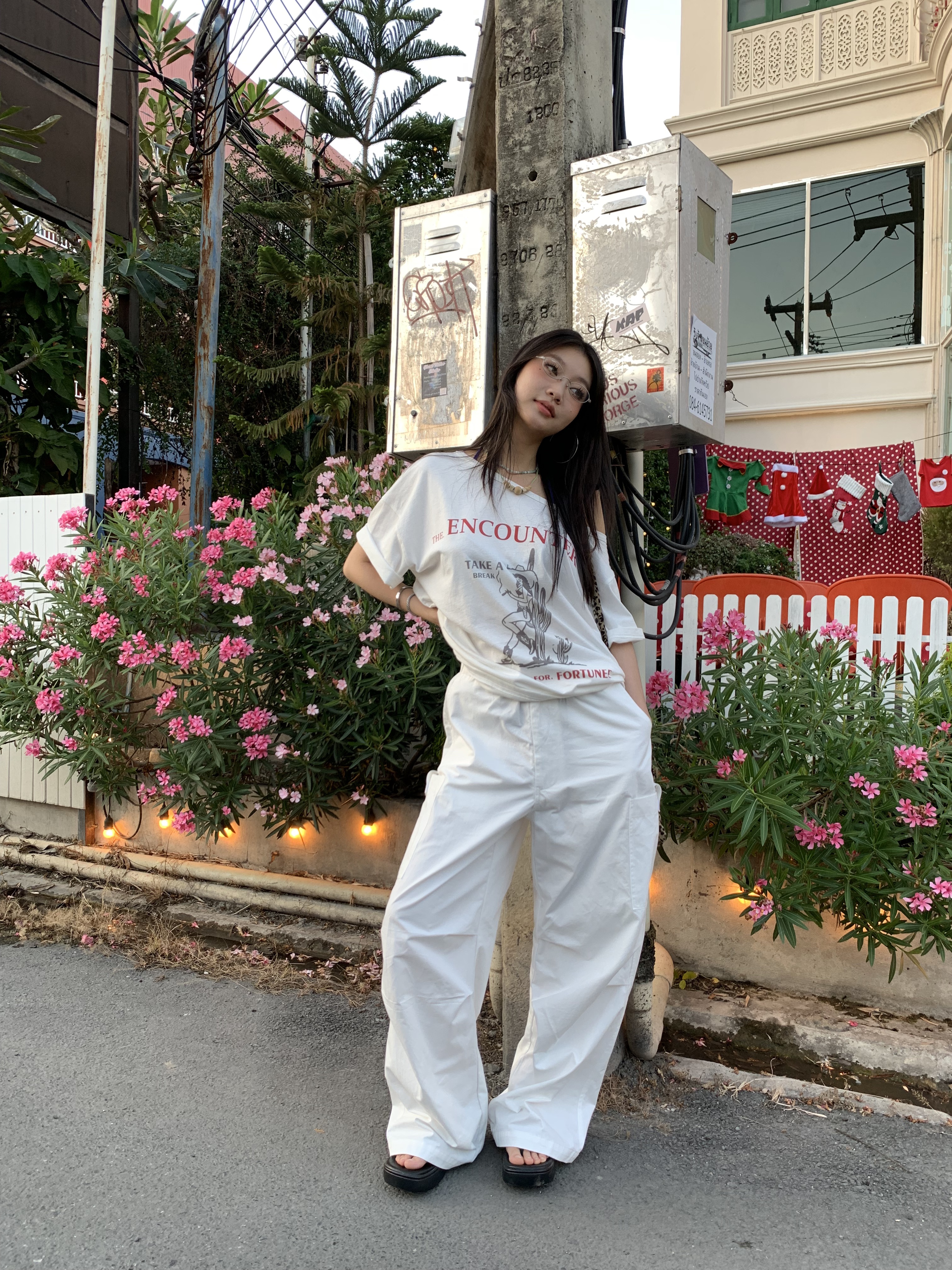 Off-shoulder design T-shirt with a denim cowboy print