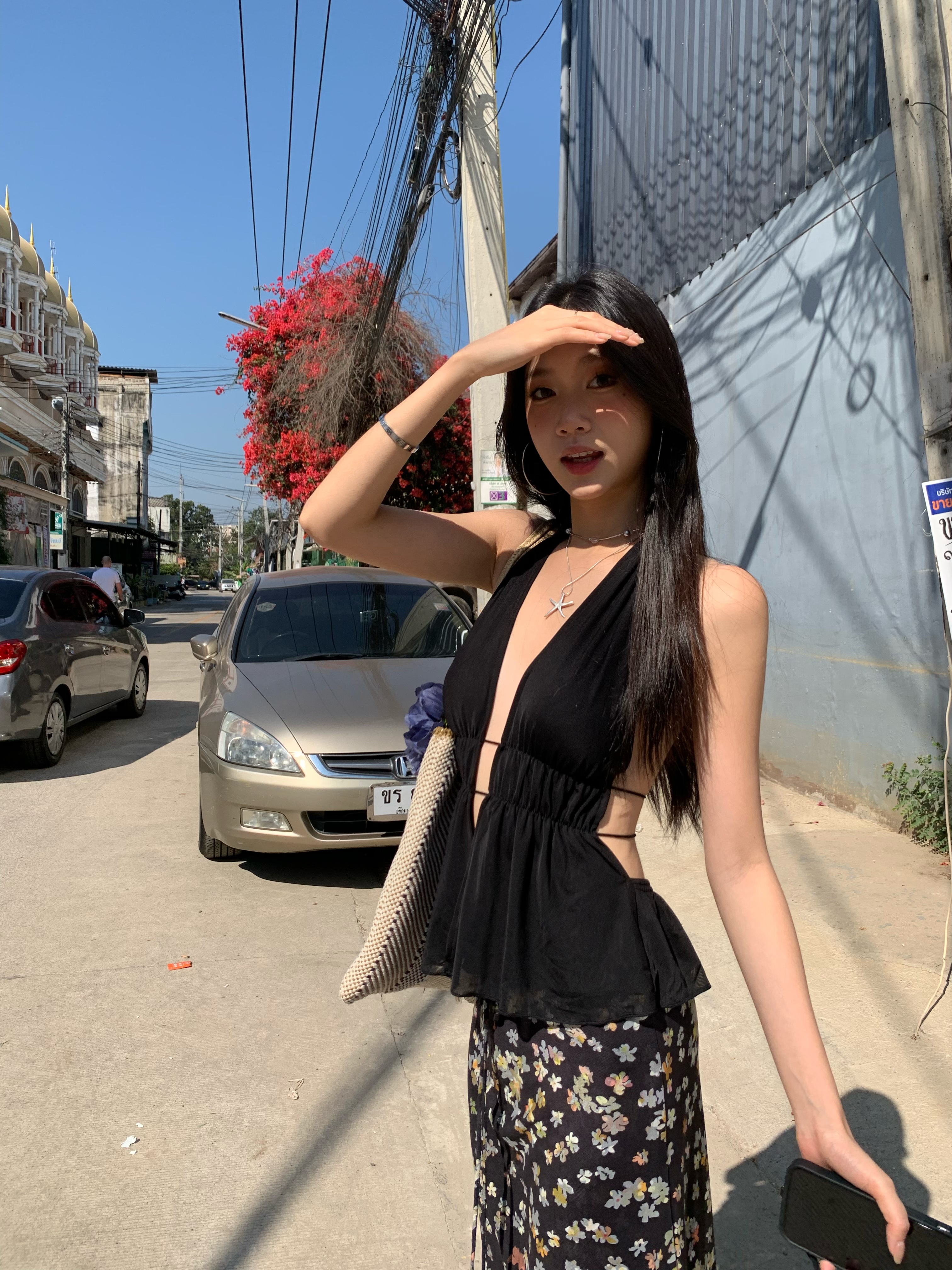 Black halter neck open back sleeveless crop top