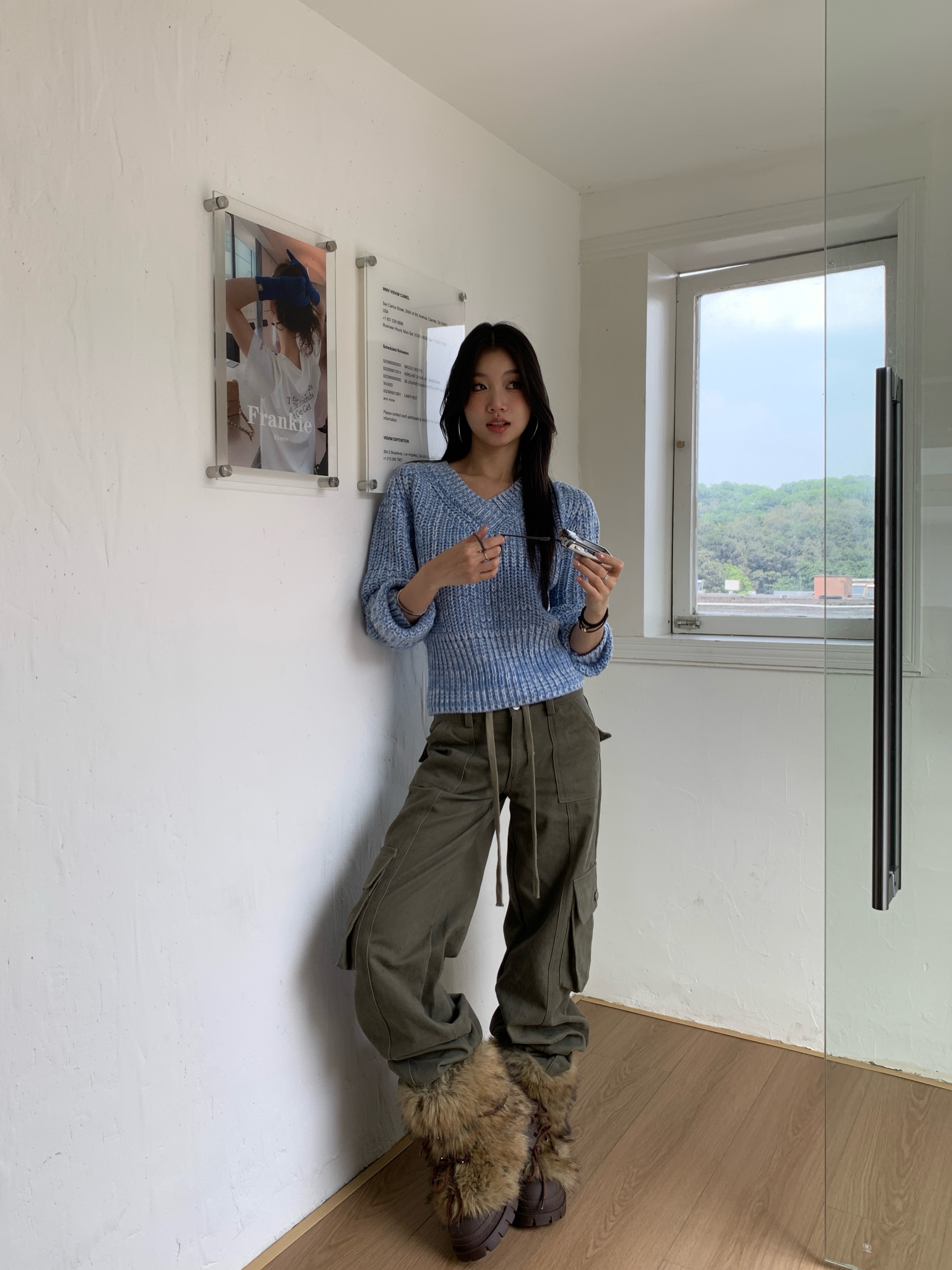 Vintage low-rise cargo pants with multiple pockets and a wide, straight leg.